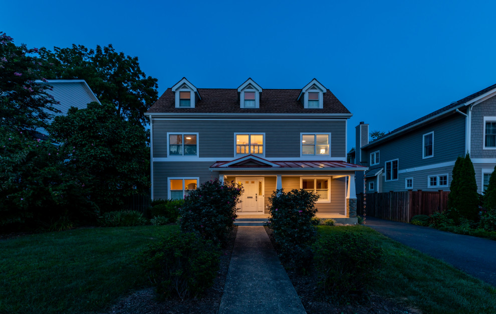 Large trendy beige two-story exterior home photo in DC Metro