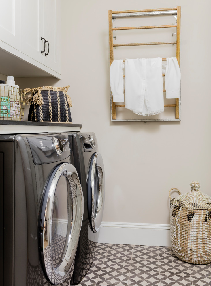 Design ideas for a transitional laundry room in Boston.