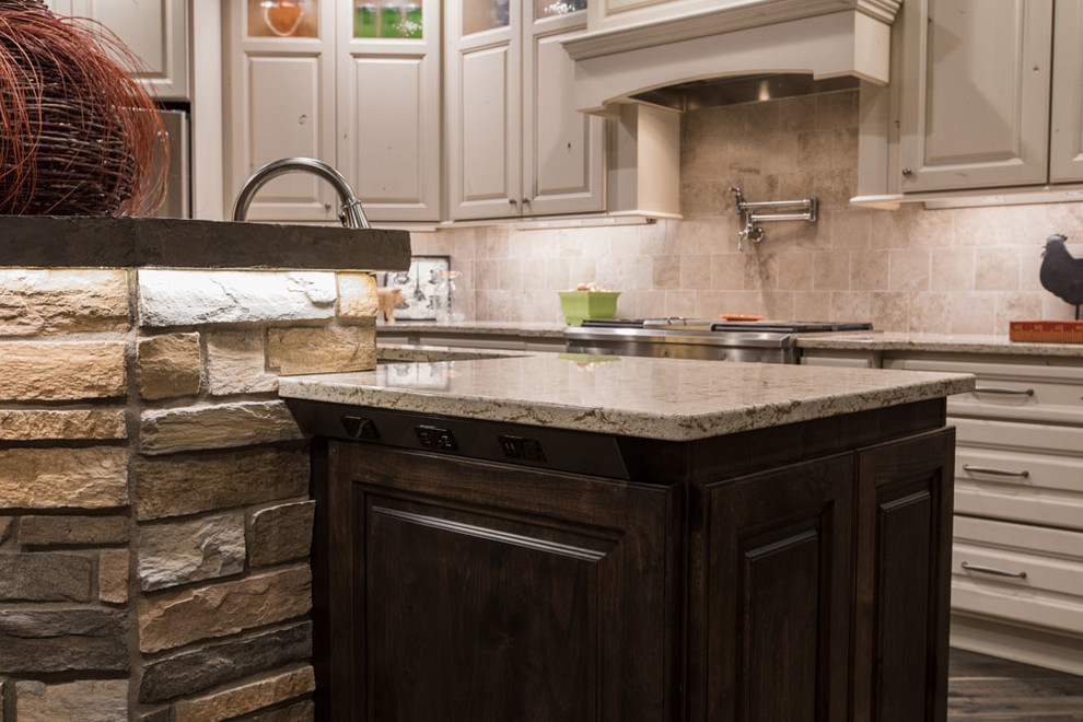 Inspiration for a mid-sized transitional open concept kitchen remodel with raised-panel cabinets, white cabinets, quartz countertops, stainless steel appliances and an island