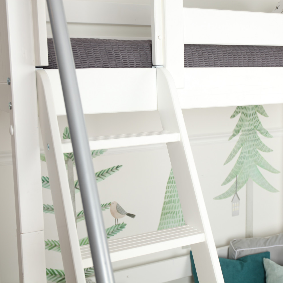 Example of a small urban gender-neutral wallpaper kids' bedroom design in Other