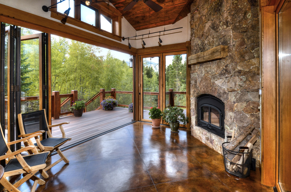 This is an example of a country sunroom in Denver.