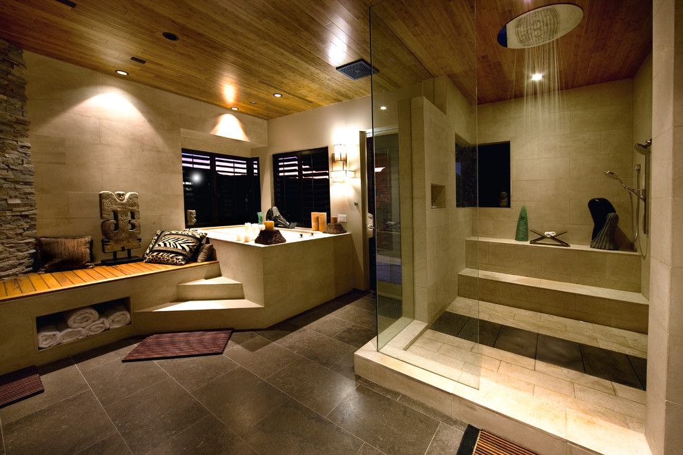 This is an example of a contemporary bathroom in Las Vegas with a japanese tub, an open shower, beige tile and an open shower.