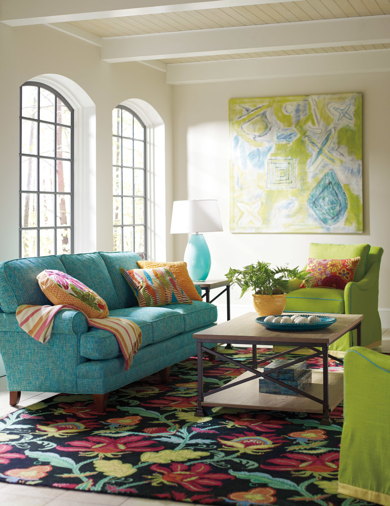 Transitional living room in Miami with white walls.