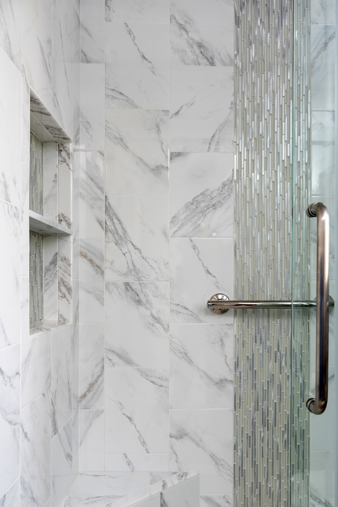 Large transitional master white tile and marble tile travertine floor and beige floor alcove shower photo with shaker cabinets, gray cabinets, a two-piece toilet, beige walls, an undermount sink, quartzite countertops and white countertops