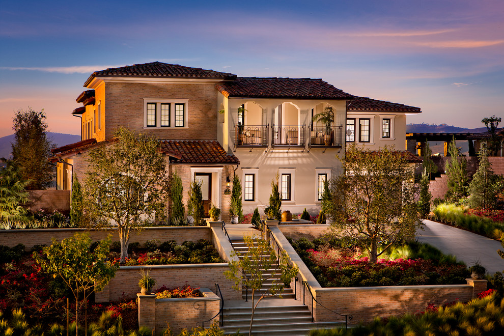 Photo of a large mediterranean one-storey exterior in Los Angeles.
