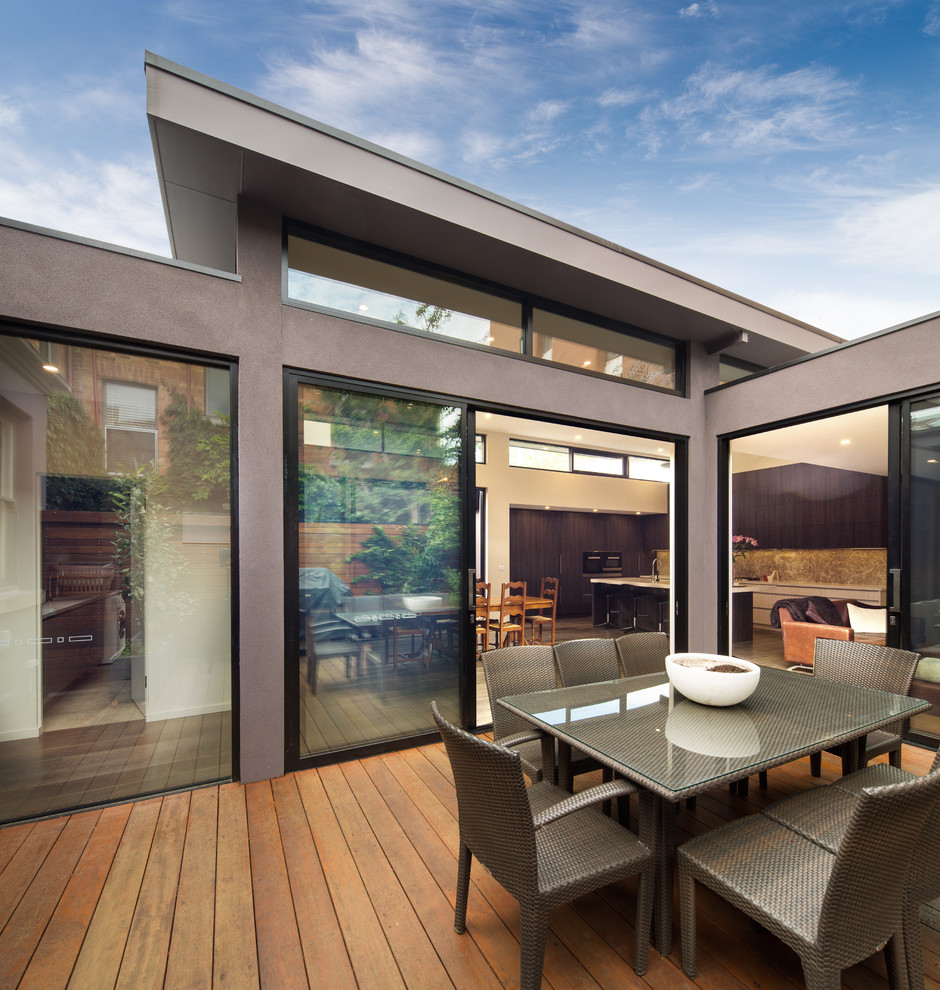 Inspiration for a mid-sized contemporary backyard deck in Melbourne with no cover.