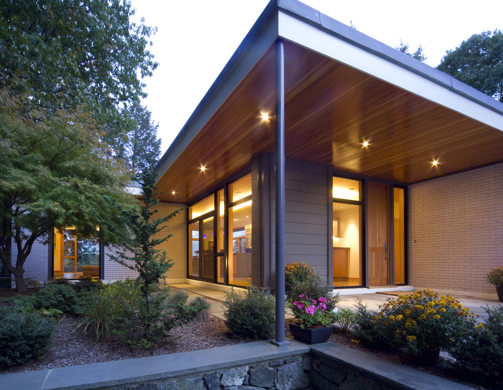 Contemporary exterior in Boston with wood siding.