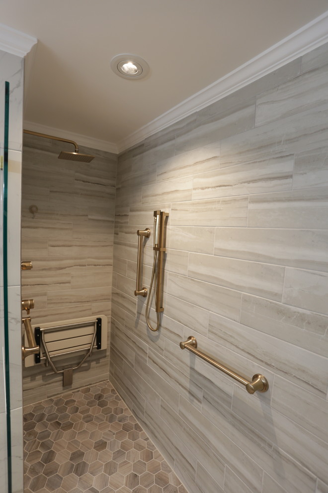 Inspiration for a large transitional master bathroom in DC Metro with flat-panel cabinets, medium wood cabinets, a freestanding tub, a double shower, a bidet, white tile, porcelain tile, white walls, porcelain floors, an undermount sink, soapstone benchtops, white floor, an open shower and black benchtops.