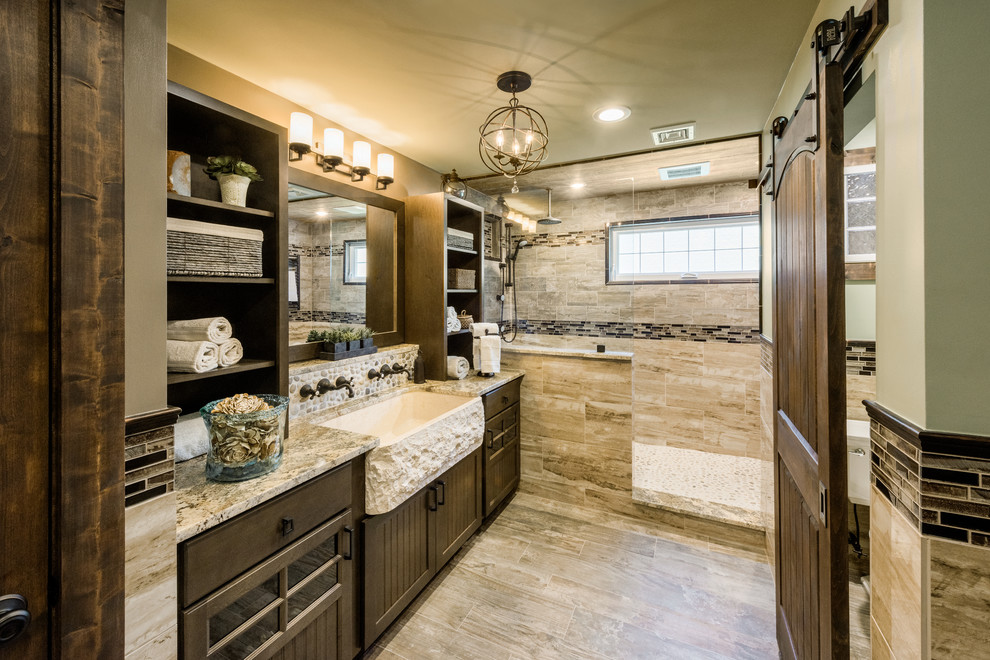 Design ideas for a large country master bathroom in Providence with beaded inset cabinets, dark wood cabinets, an open shower, a two-piece toilet, brown tile, porcelain tile, green walls, porcelain floors, a trough sink and granite benchtops.