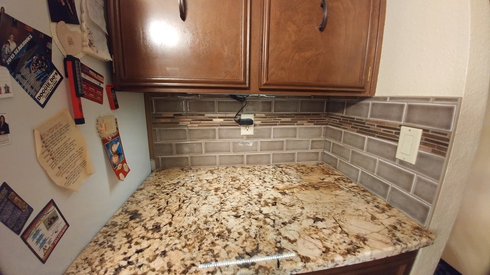 Inspiration for a kitchen remodel in Seattle with subway tile backsplash
