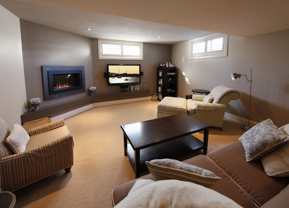 Photo of a modern family room in Toronto.