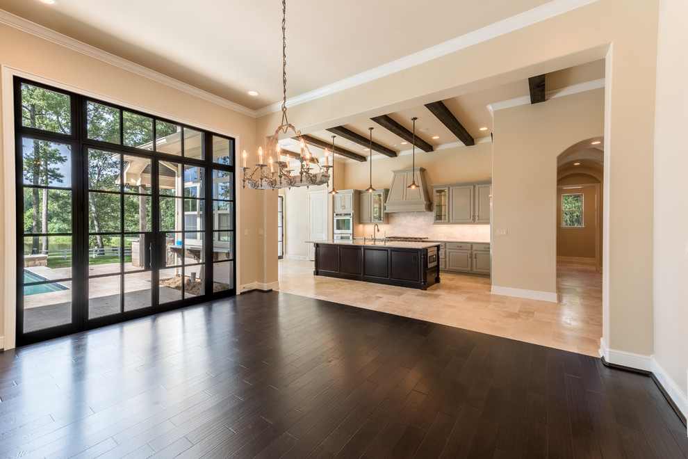 Inspiration for a huge transitional l-shaped porcelain tile and beige floor open concept kitchen remodel in Houston with a farmhouse sink, raised-panel cabinets, gray cabinets, marble countertops, gray backsplash, subway tile backsplash, stainless steel appliances, an island and white countertops