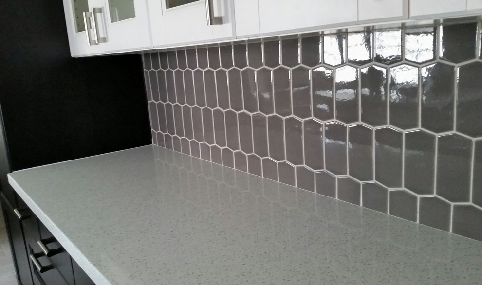 Photo of a transitional kitchen in Minneapolis with grey splashback.