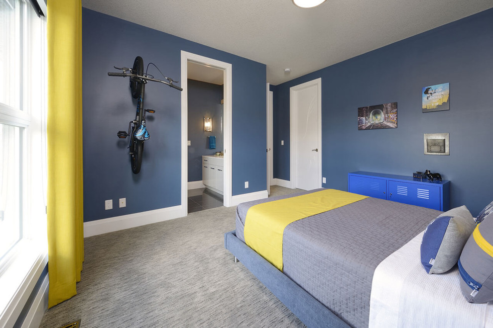 Large contemporary bedroom in Edmonton with blue walls, carpet and no fireplace.