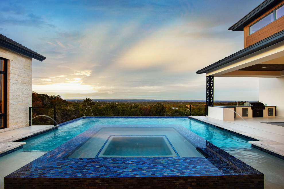 Inspiration for a transitional pool remodel in Austin