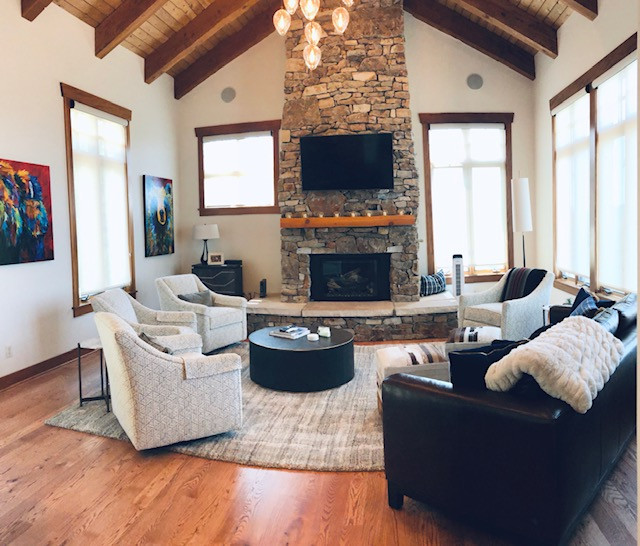 Example of a transitional home design design in Denver