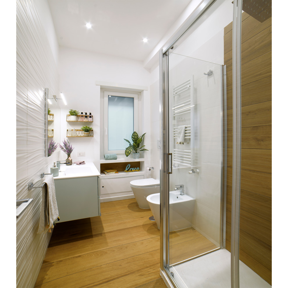 Exemple d'une petite salle d'eau moderne avec un placard à porte plane, des portes de placards vertess, une douche d'angle, WC séparés, un carrelage blanc, des carreaux de porcelaine, un mur blanc, un sol en carrelage imitation parquet, une vasque, un plan de toilette en surface solide, un sol marron, une cabine de douche à porte coulissante, un plan de toilette blanc, une niche, meuble simple vasque, meuble-lavabo suspendu et un plafond décaissé.