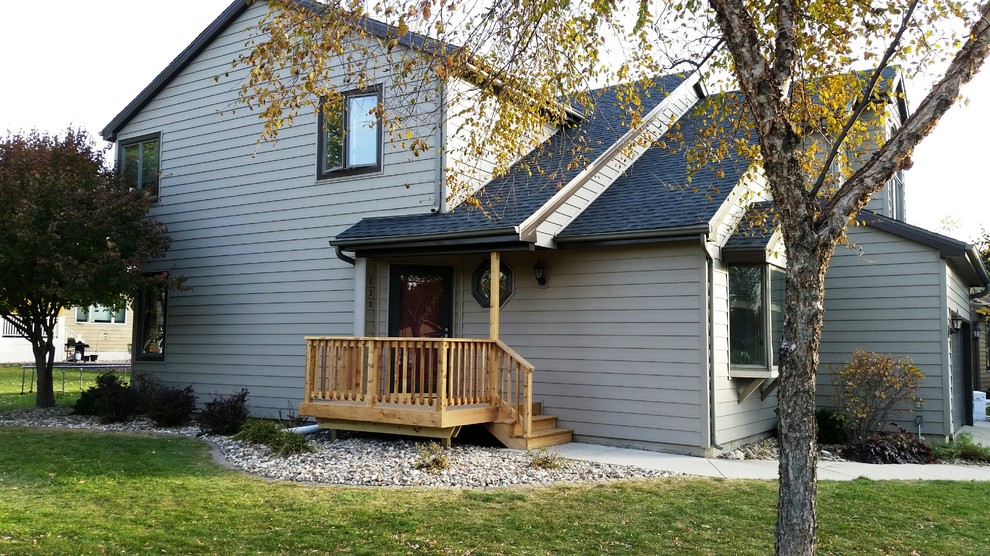 Example of a minimalist exterior home design in Other