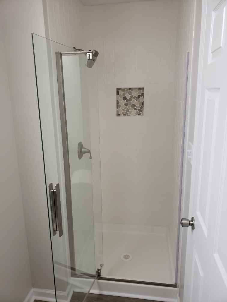 Two Bathroom Renovations and Custom Closet Shelving with Custom Tile Showers