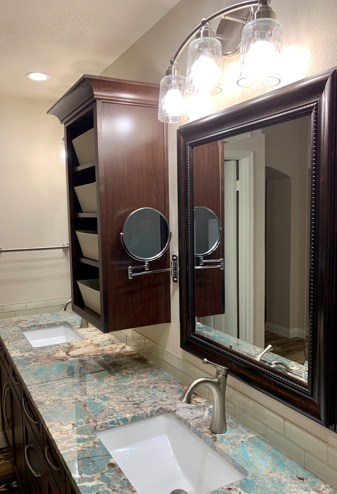 Photo of a mid-sized transitional master bathroom in Phoenix with shaker cabinets, medium wood cabinets, an alcove shower, gray tile, porcelain tile, beige walls, porcelain floors, a drop-in sink, granite benchtops, multi-coloured floor, an open shower and turquoise benchtops.