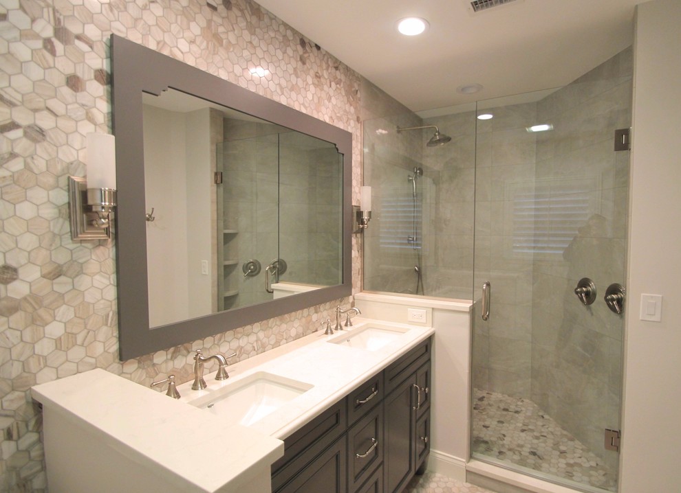 Design ideas for a mid-sized transitional master bathroom in Orlando with recessed-panel cabinets, dark wood cabinets, a double shower, grey walls, an undermount sink, quartzite benchtops, a hinged shower door, gray tile, marble, marble floors and grey floor.