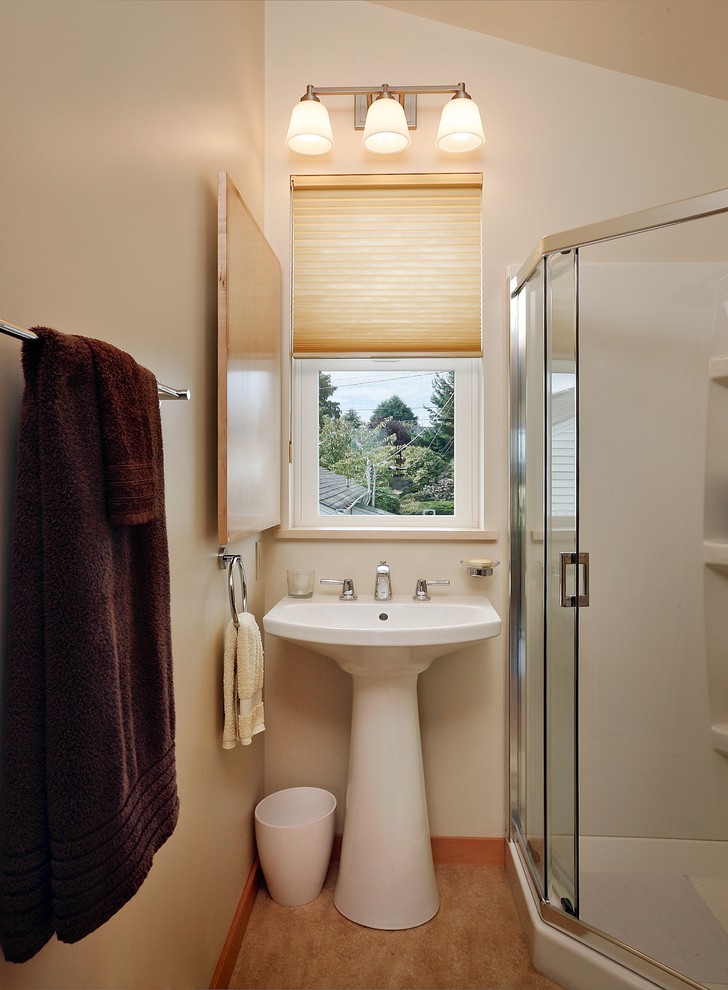 Design ideas for a small contemporary bathroom in Seattle with a pedestal sink, a corner shower and a two-piece toilet.