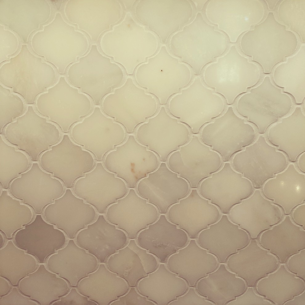 How to get hard water stains off carrera marble?