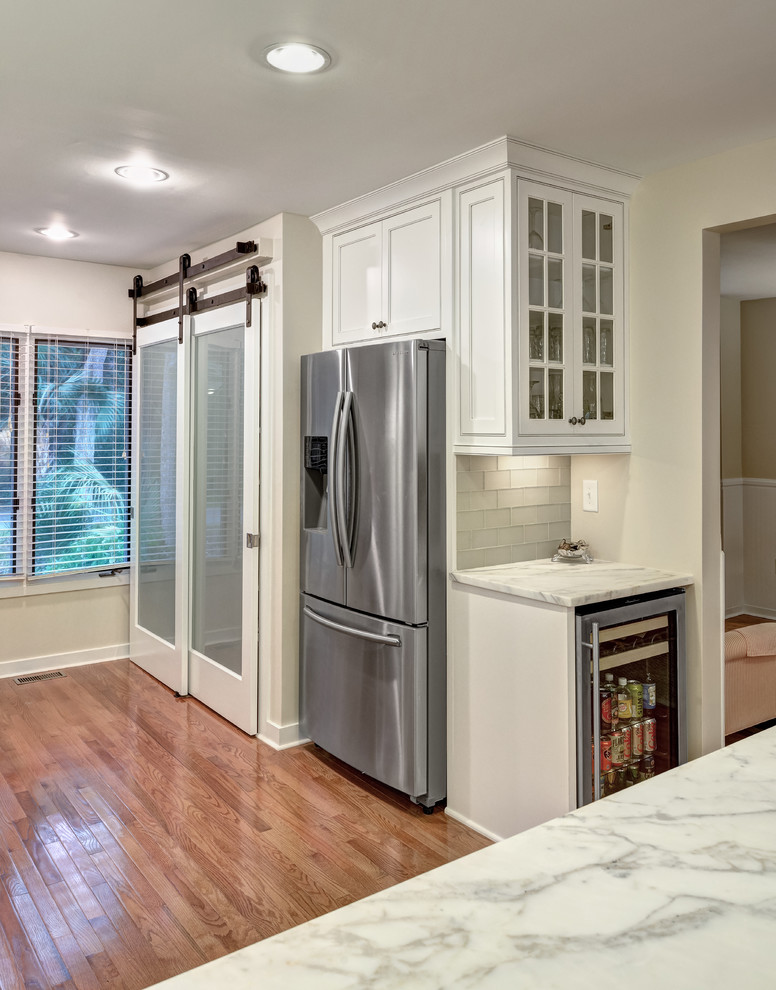 This is an example of a transitional kitchen in Charleston.