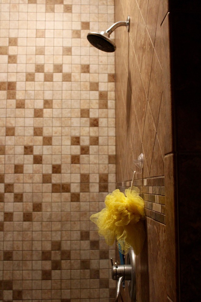 Example of a large transitional master beige tile and mosaic tile porcelain tile and beige floor alcove shower design with red walls