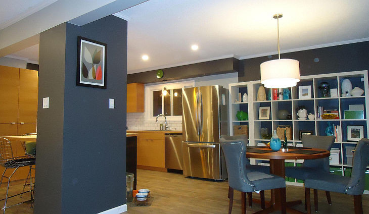 Photo of a contemporary open plan dining in Vancouver with grey walls and linoleum floors.