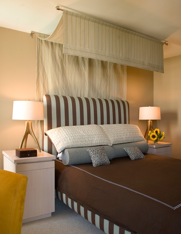 Design ideas for a transitional master bedroom in San Diego with beige walls.
