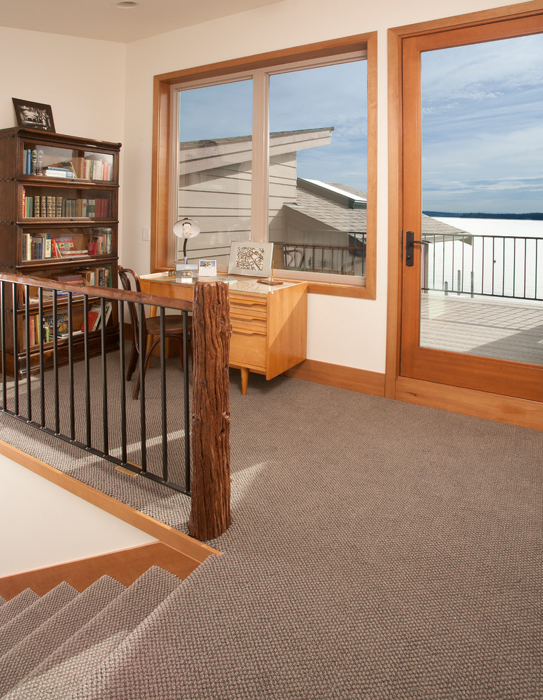 Mid-sized mountain style carpeted l-shaped staircase photo in Seattle with carpeted risers