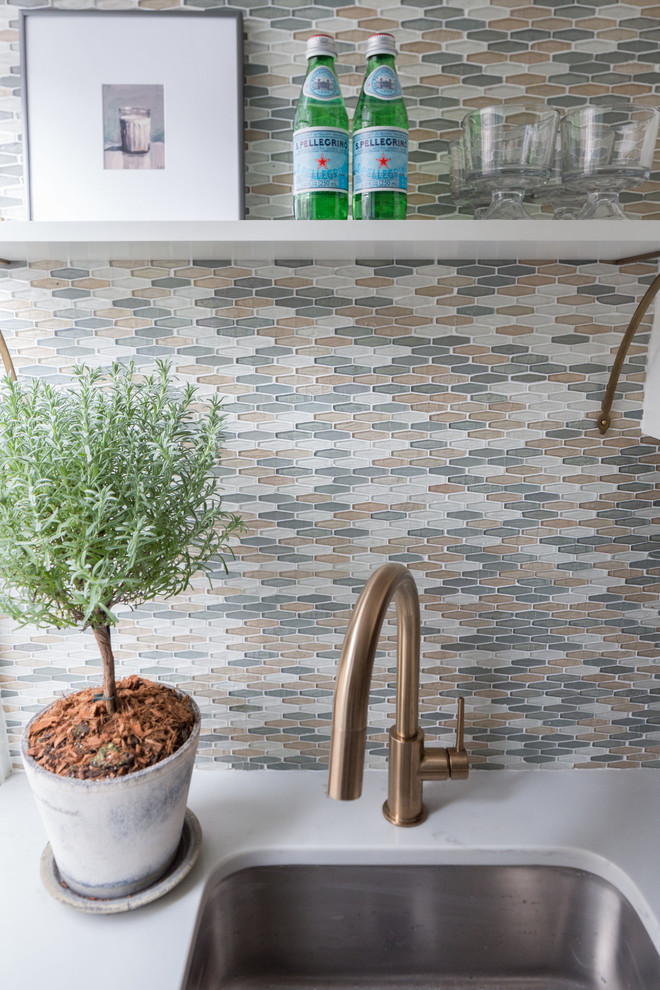 Example of a small transitional galley home design design in DC Metro with shaker cabinets, white cabinets, glass tile backsplash and stainless steel appliances