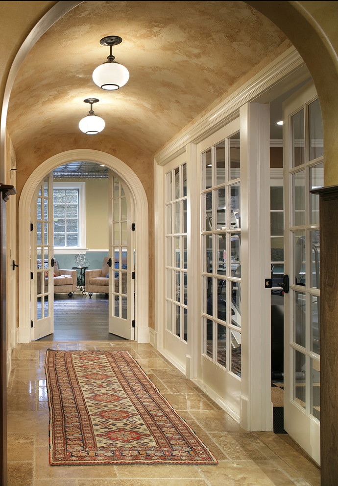 Inspiration for a traditional hallway in New York with beige walls.