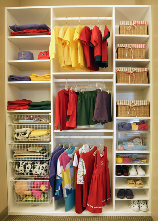 Photo of a contemporary storage and wardrobe in St Louis.