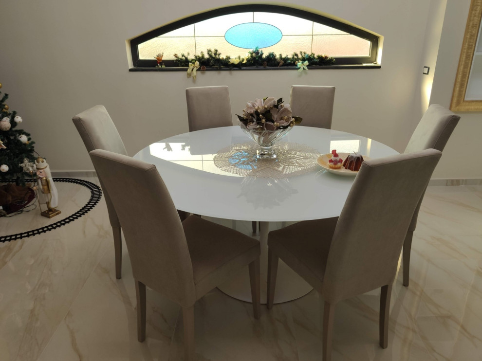 Photo of a contemporary dining room in Naples.