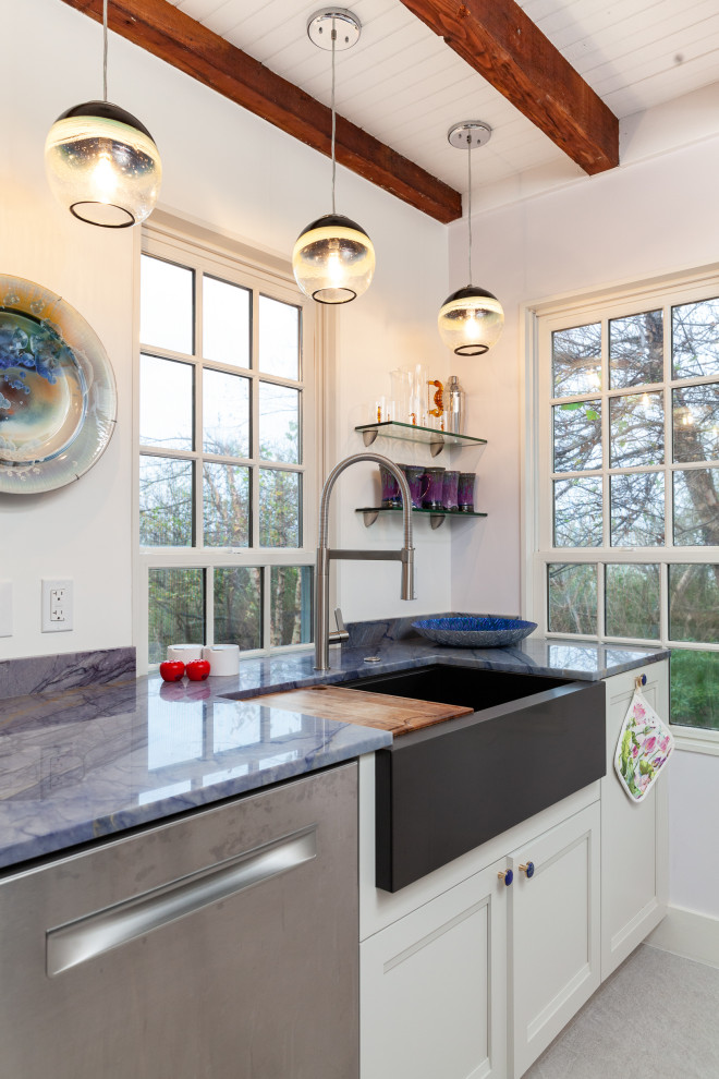 Inspiration for a small modern galley kitchen in Boston with a farmhouse sink, shaker cabinets, white cabinets, quartzite benchtops, blue splashback, stainless steel appliances, marble floors, no island, grey floor, blue benchtop and exposed beam.