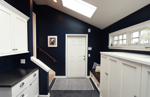 Navy Blue Mudroom Off Kitchen With Coat Closets And Bench