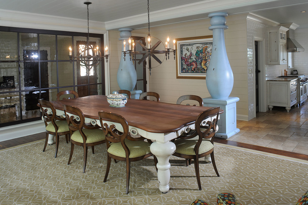 Traditional dining room in Cleveland with beige walls and dark hardwood floors.