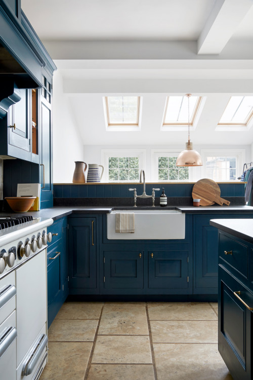 Vibrant Blue Cabinets and Granite Backsplash: Kitchen Sink Backsplash Ideas