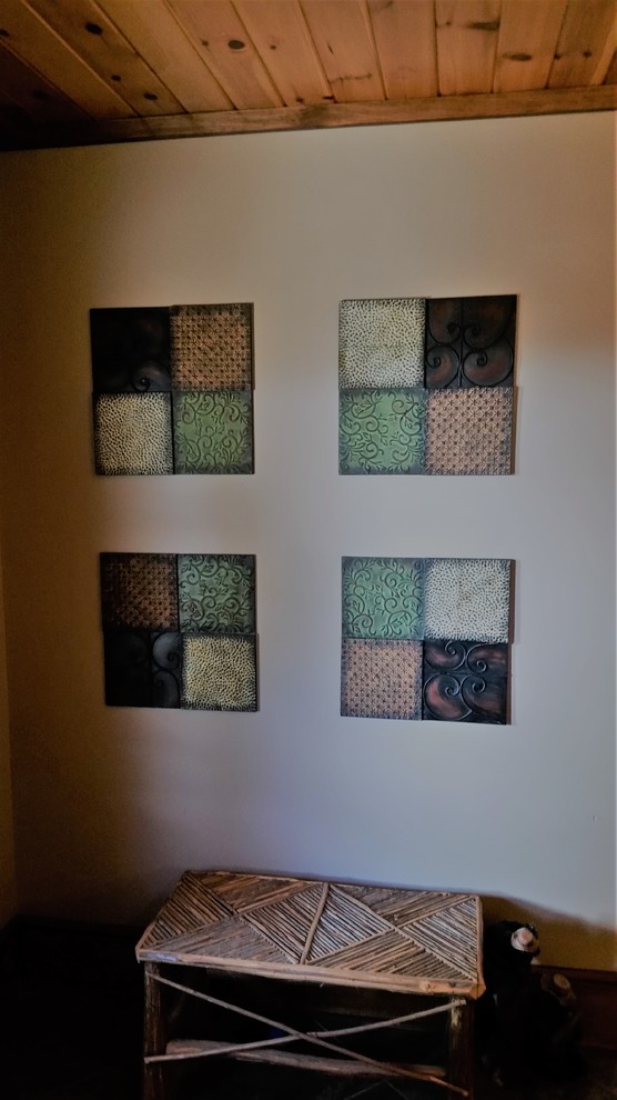 Example of a mid-sized mountain style slate floor foyer design