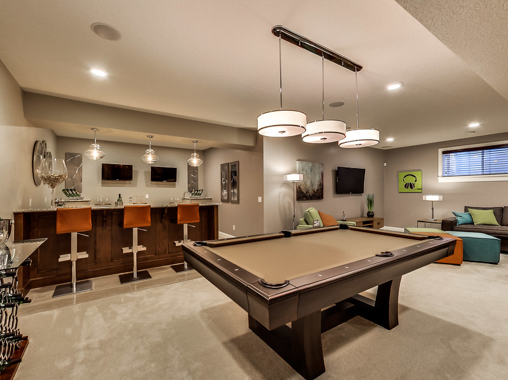 Inspiration for a transitional look-out basement in Edmonton with grey walls and carpet.