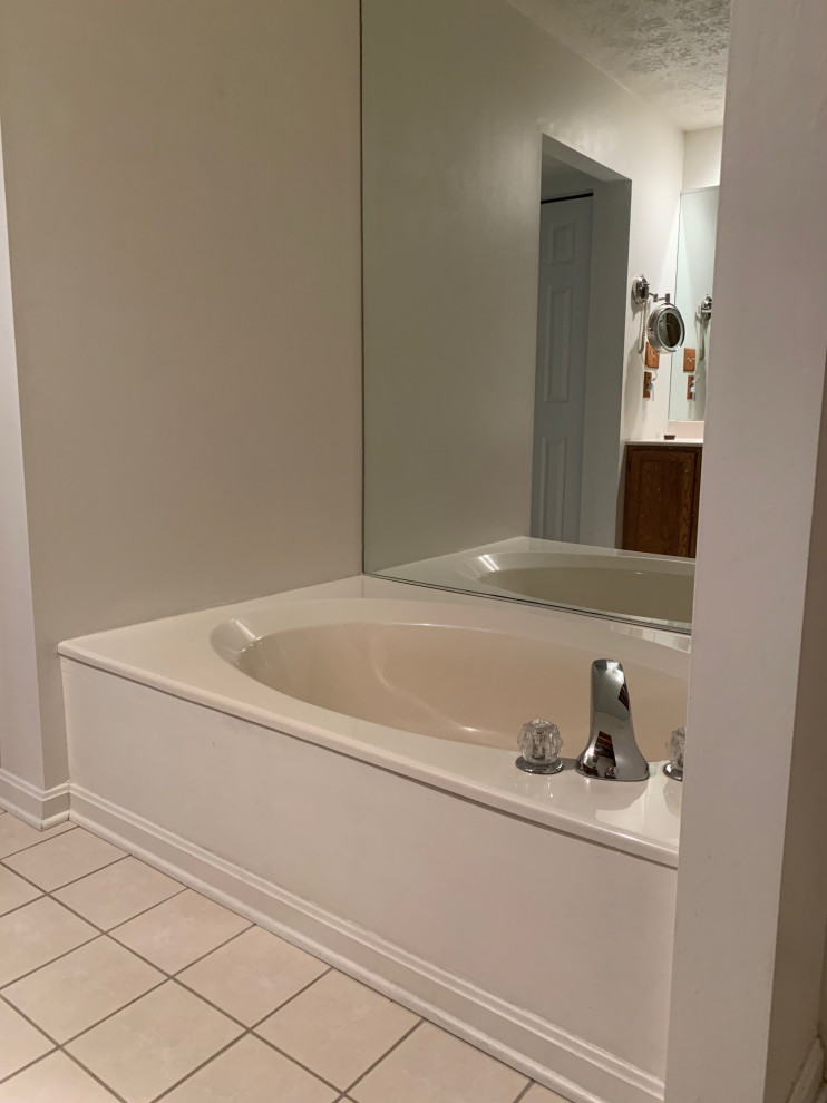 Design ideas for a mid-sized transitional master bathroom in Other with shaker cabinets, white cabinets, a one-piece toilet, blue tile, ceramic tile, beige walls, ceramic floors, an undermount sink, quartzite benchtops, beige floor, white benchtops, a shower seat, a single vanity and a freestanding vanity.