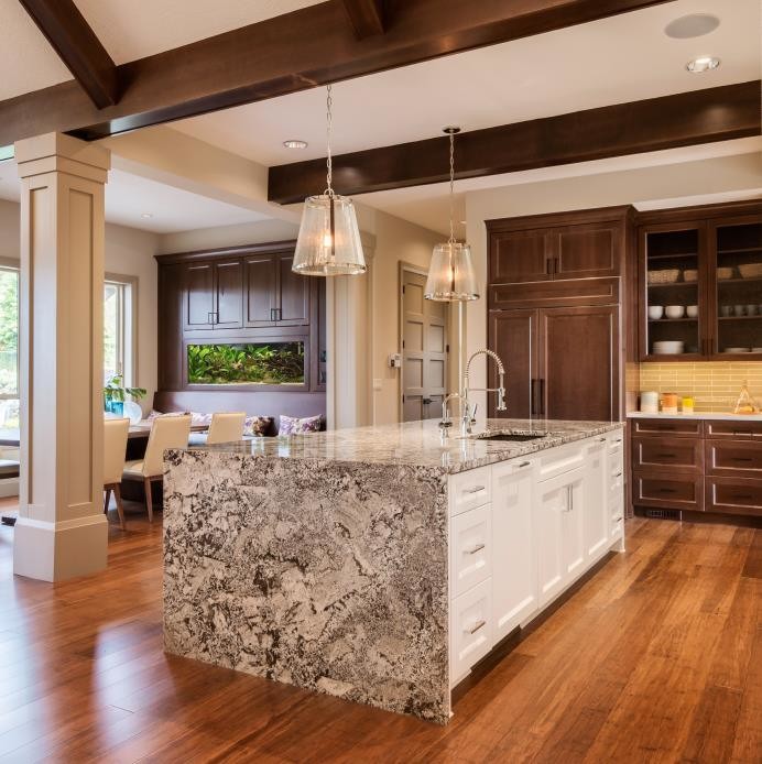 Transitional medium tone wood floor kitchen photo in Miami with shaker cabinets, dark wood cabinets, granite countertops, beige backsplash, subway tile backsplash and an island