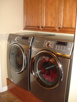 Inspiration for a traditional laundry room in Charlotte.