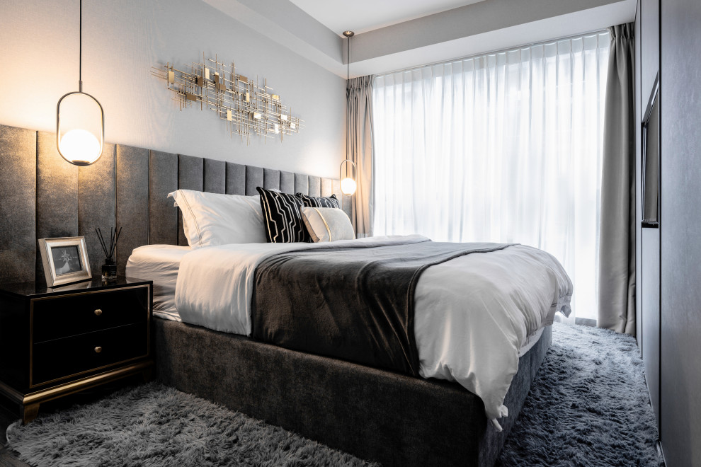Inspiration for a modern bedroom in Singapore.