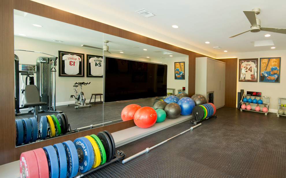 Design ideas for a contemporary home weight room in Orange County with white walls.