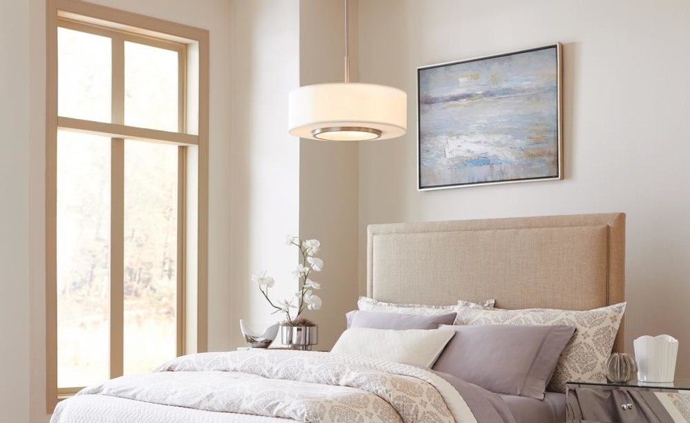 Inspiration for a small transitional guest bedroom in Other with beige walls.
