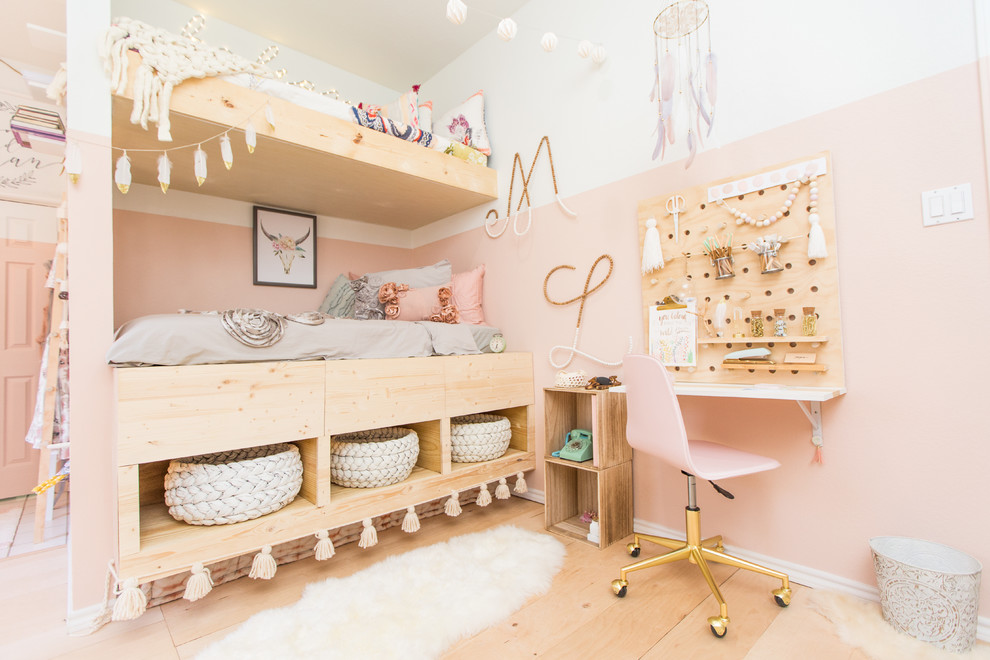 Inspiration for a scandinavian kids' room for girls in Dallas with light hardwood floors and multi-coloured walls.