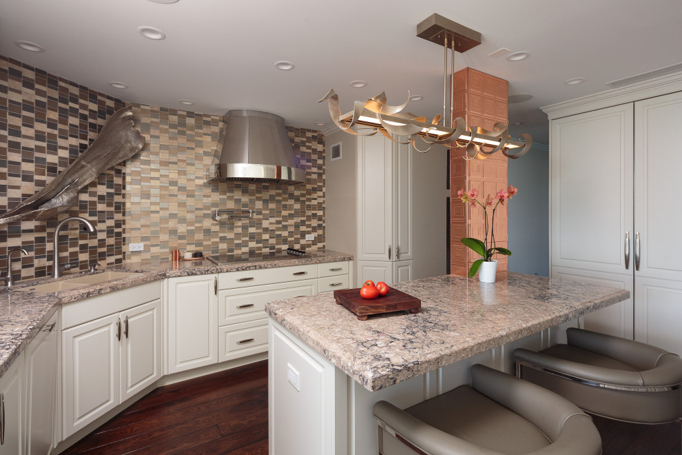 Inspiration for a transitional medium tone wood floor kitchen remodel in Chicago with a double-bowl sink, raised-panel cabinets, white cabinets, multicolored backsplash, an island and multicolored countertops